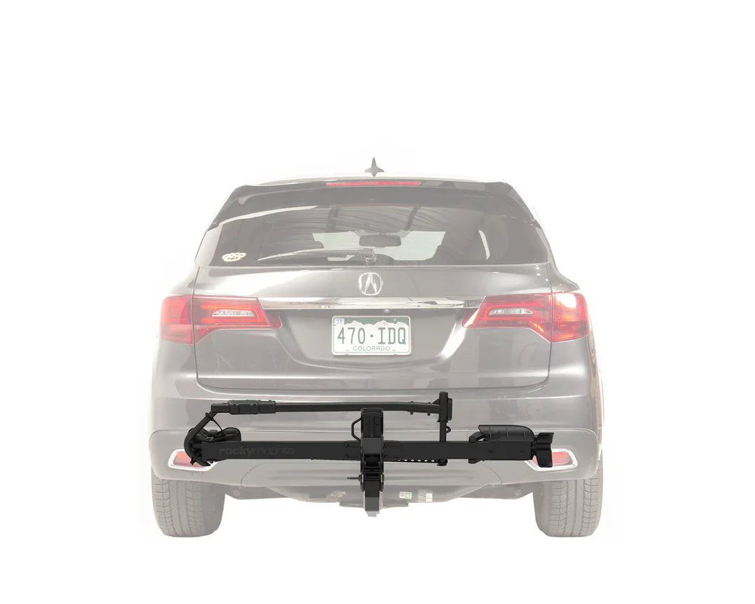 Car with a rocky mounts highnoon solo bike rack attached on a white background