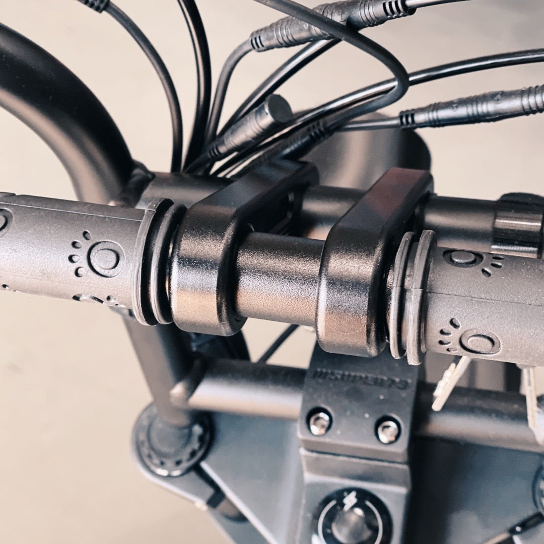 Close up of a kids handle bar on an ebike